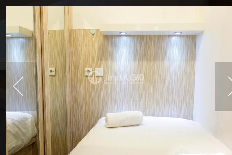 Bedroom 1 Middle Floor 2BR Apartment with Pool View at Serpong Green View Apartment
