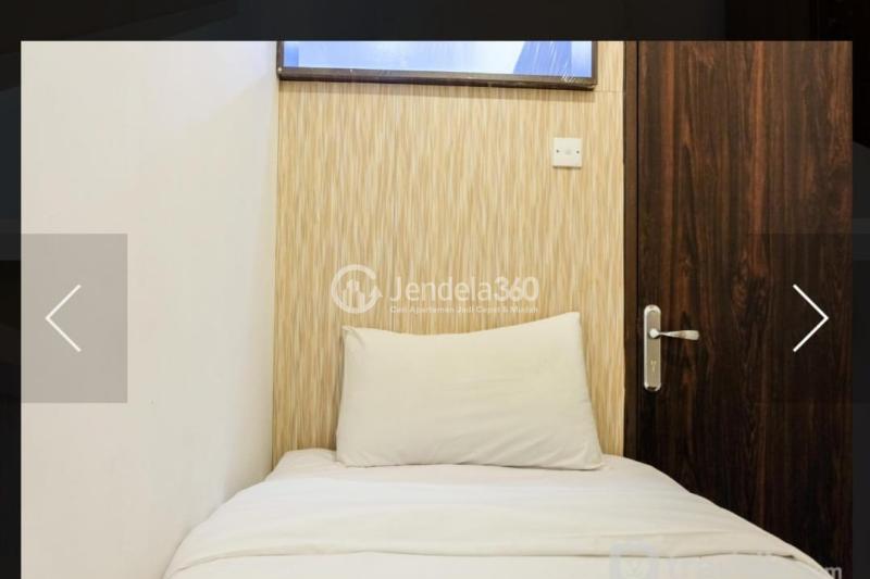 Bedroom 2 Middle Floor 2BR Apartment with Pool View at Serpong Green View Apartment