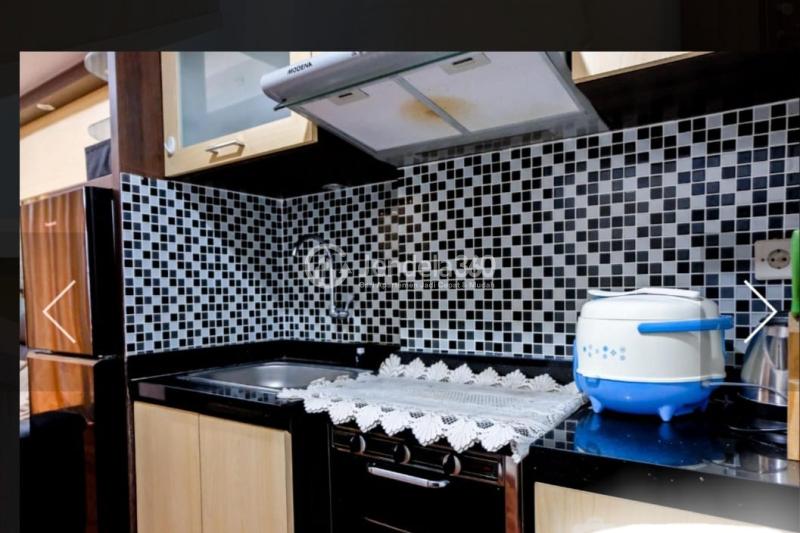 Kitchen Middle Floor 2BR Apartment with Pool View at Serpong Green View Apartment