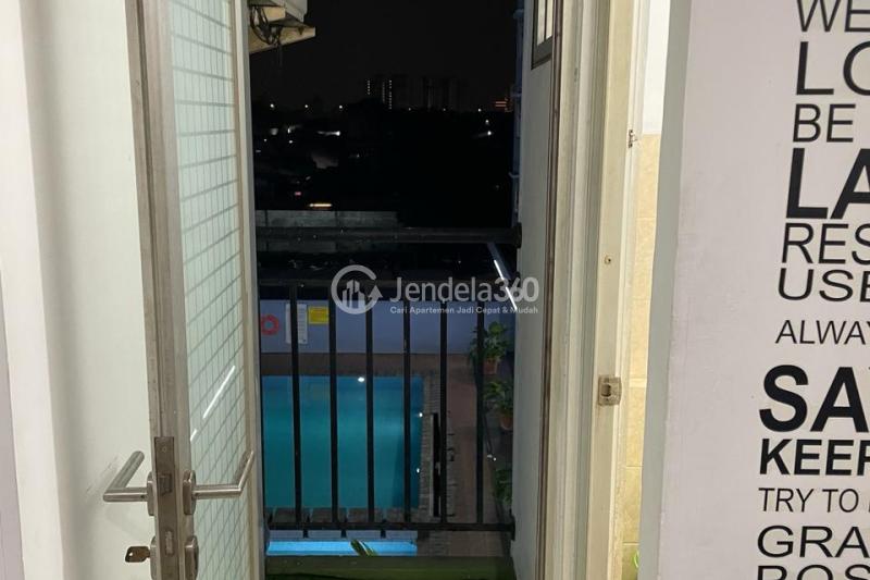 Balcony Decorative 1BR Apartment at Green Park View Apartment Low Floor