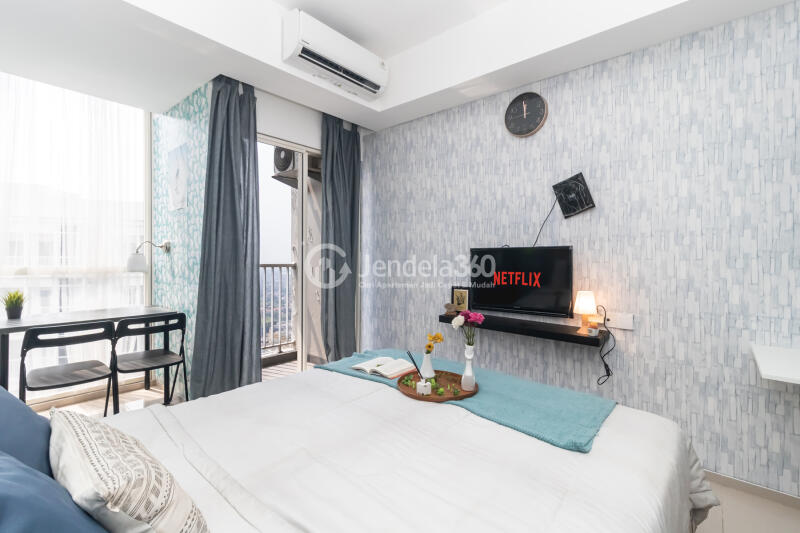 Bedroom Cozy Studio Apartment High Floor with City View at Pacific Garden Apartment