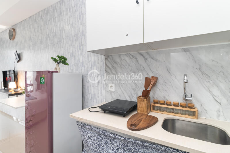 Kitchen Cozy Studio Apartment High Floor with City View at Pacific Garden Apartment