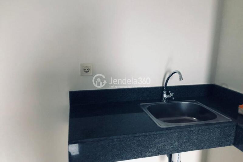 Kitchen Lovely 2BR Apartment at Transpark Cibubur Apartment Tower Borealis