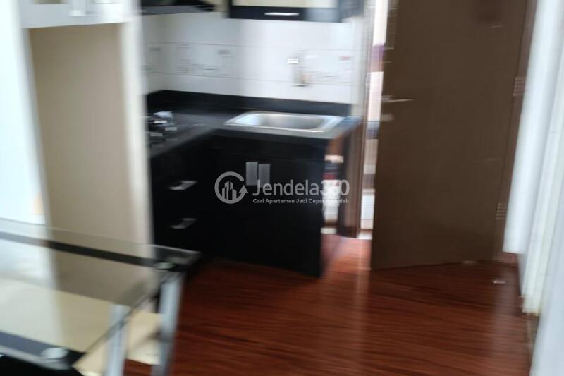 Kitchen Well Furnished 2BR Apartment Middle Floor with Swimming Pool View at The Suites @ Metro Bandung