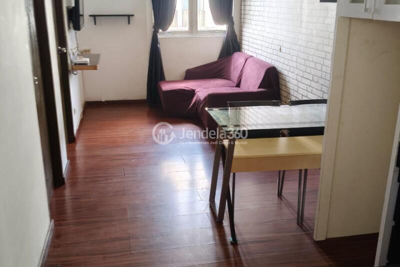 Living Room Well Furnished 2BR Apartment Middle Floor with Swimming Pool View at The Suites @ Metro Bandung