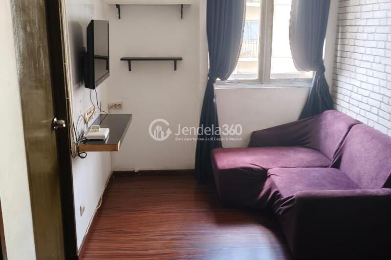 Living Room Well Furnished 2BR Apartment Middle Floor with Swimming Pool View at The Suites @ Metro Bandung