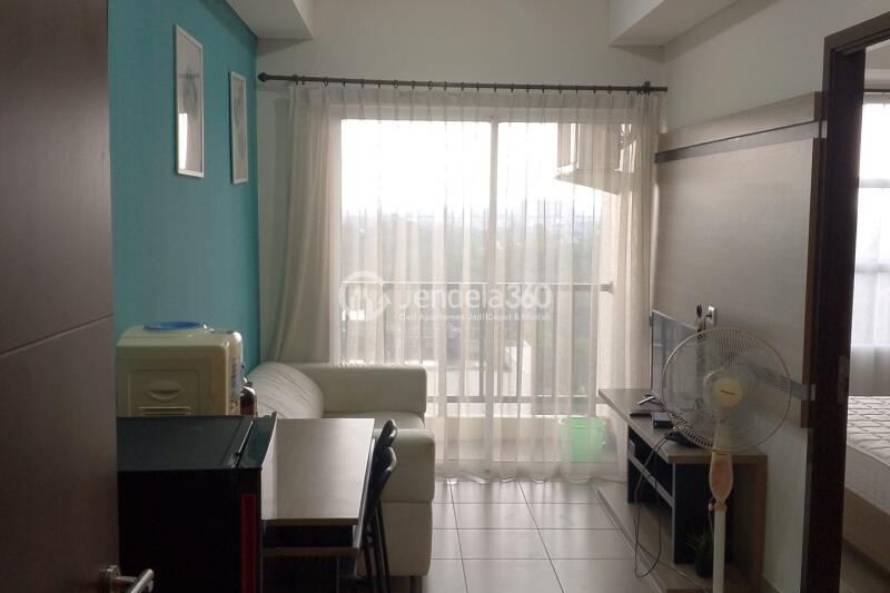 Living Room Decorative 1BR Apartment Middle Floor with  View at Saveria Apartment