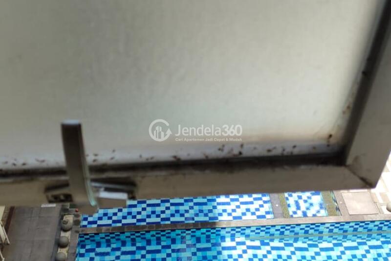 Balcony Elegant Studio Apartment at Emerald Tower Apartment Low Floor
