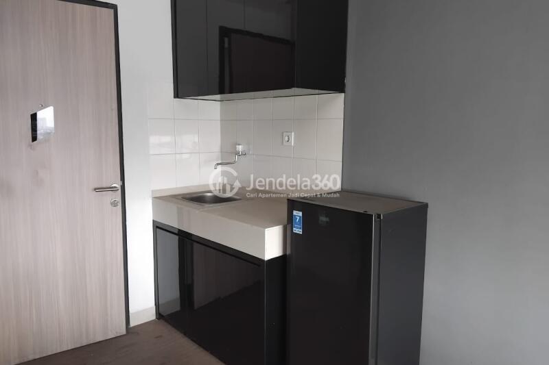 Kitchen Strategic Location Studio Apartment at Monroe Jababeka Apartment Middle Floor