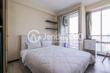 Bedroom High Floor Studio Apartment with Jakarta International Equestrian Park View at Tifolia Apartment