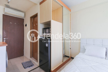 Bedroom High Floor Studio Apartment with Jakarta International Equestrian Park View at Tifolia Apartment