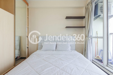Bedroom High Floor Studio Apartment with Jakarta International Equestrian Park View at Tifolia Apartment