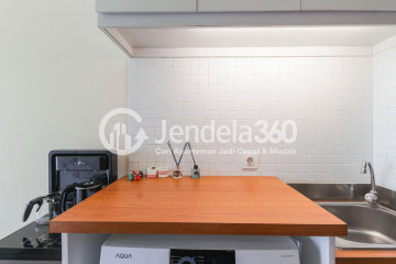 Kitchen High Floor Studio Apartment with Jakarta International Equestrian Park View at Tifolia Apartment
