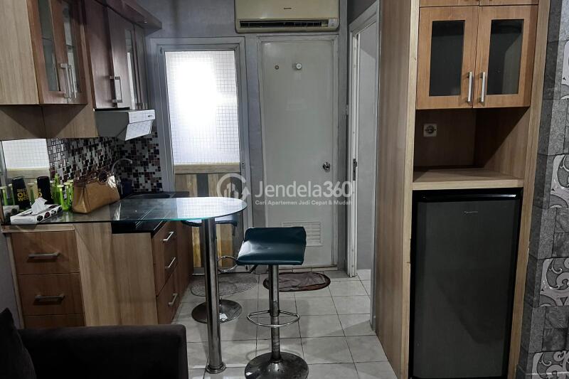 Kitchen 1BR Apartment with City View at Green Pramuka City Apartment