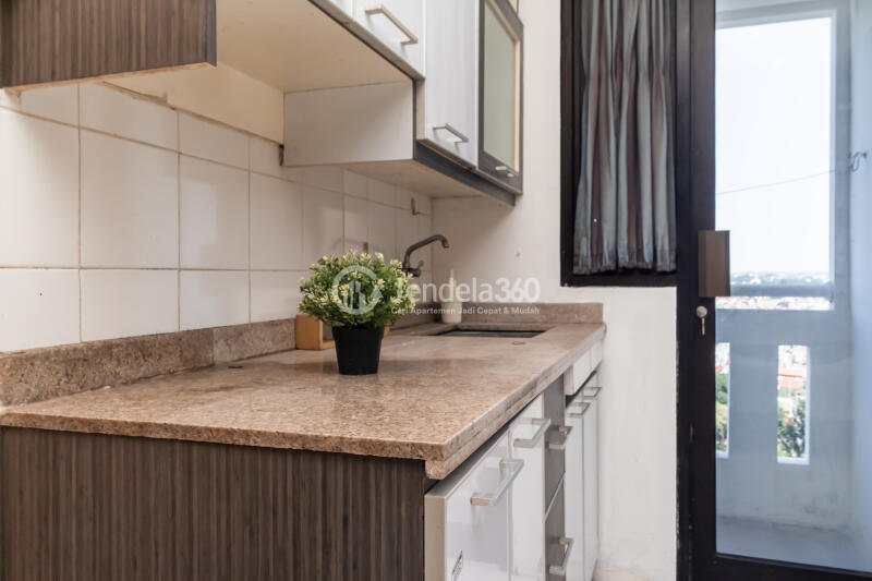 Kitchen Trendy Studio Apartment Middle Floor with  View at Kebagusan City Apartment