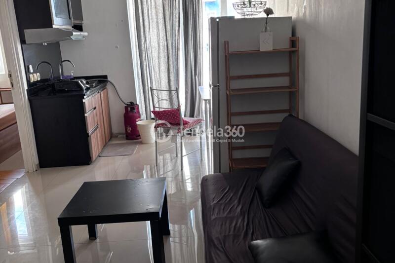 Living Room Fancy 2BR Apartment at Aeropolis Crystal Residence Tower ACR2