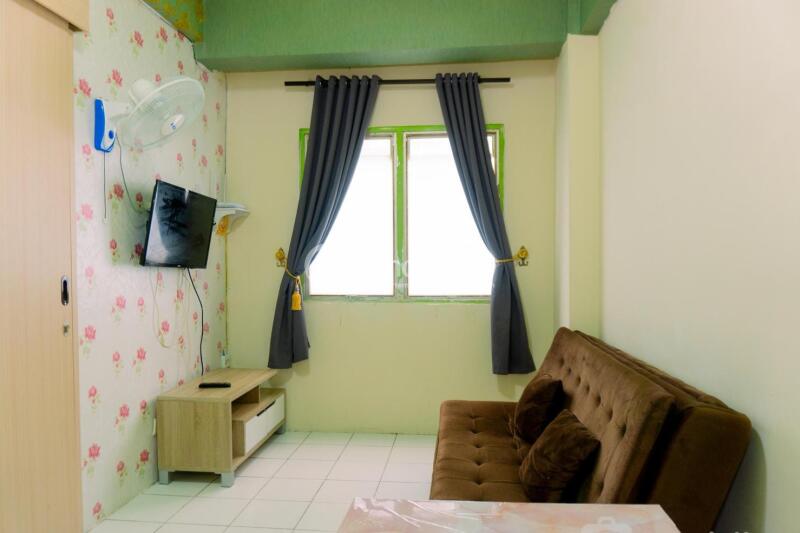 Living Room Tidy 2BR Apartment Low Floor with Parking Area View at City Park Apartment