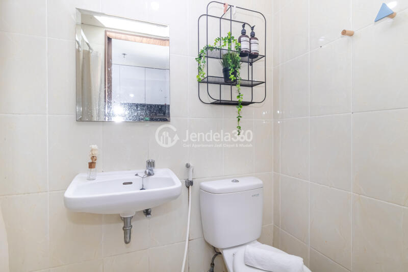 Bathroom Lovely Studio Apartment High Floor with Pool View at M Town Residence Serpong