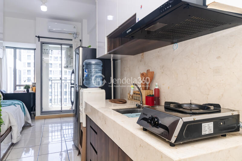 Kitchen Lovely Studio Apartment High Floor with Pool View at M Town Residence Serpong