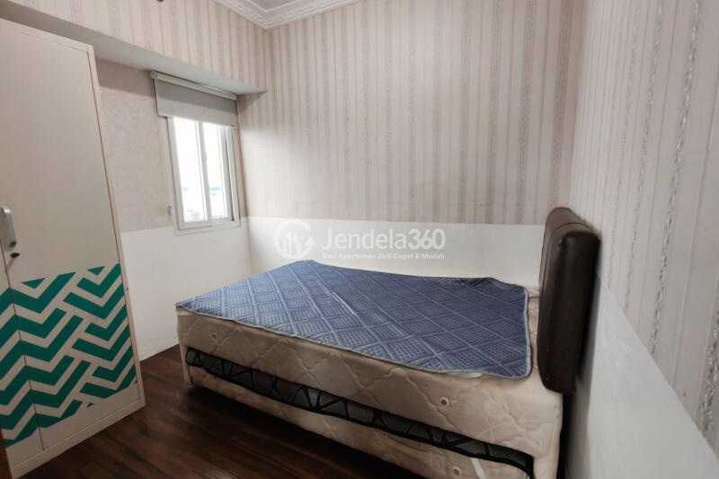 Bedroom 2 Peaceful 2BR Apartment at Mutiara Bekasi Apartment Middle Floor