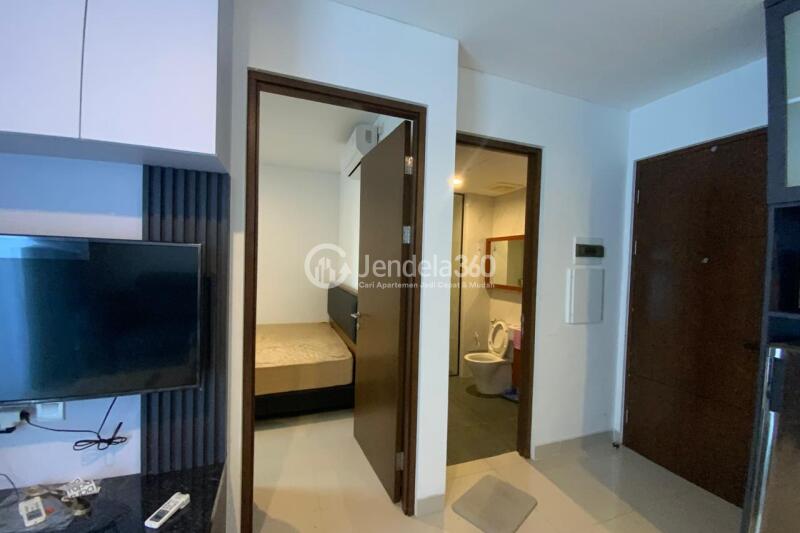 Living Room Low Floor 1BR Apartment with City View at The Newton 1 Ciputra Apartment