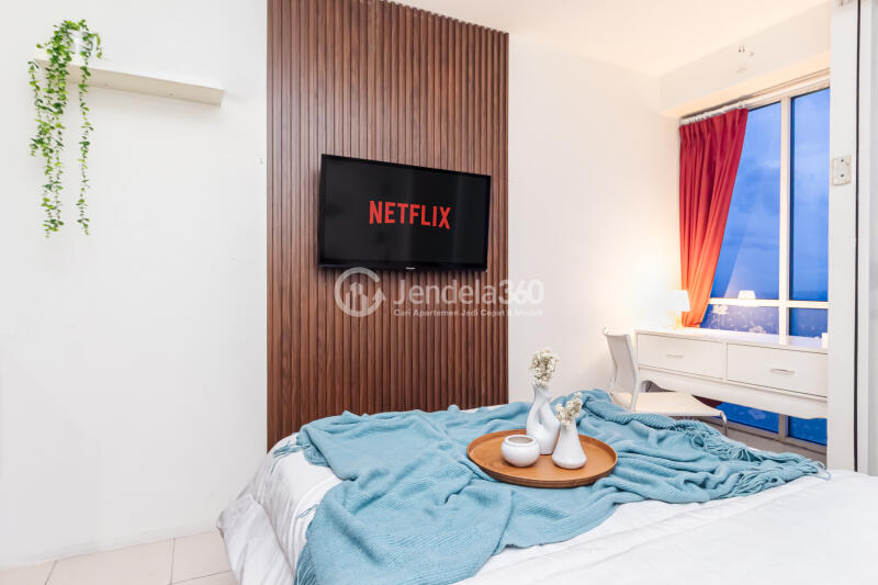 Bedroom Peaceful Studio Apartment High Floor with City View at Tifolia Apartment