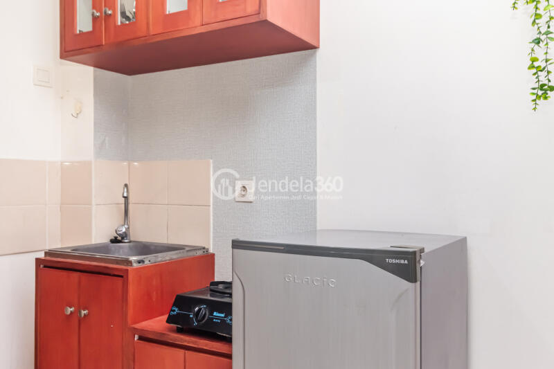 Kitchen Peaceful Studio Apartment High Floor with City View at Tifolia Apartment