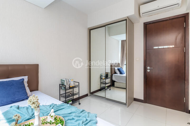 Bedroom 2 2BR Casa Grande Apartment at Low Floor Swimming Pool View