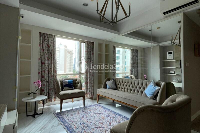 Living Room Low Floor 3BR Apartment with City View at Casa Grande Apartment
