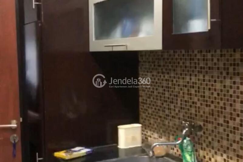 Kitchen Studio Kebagusan City Apartment at Middle Floor