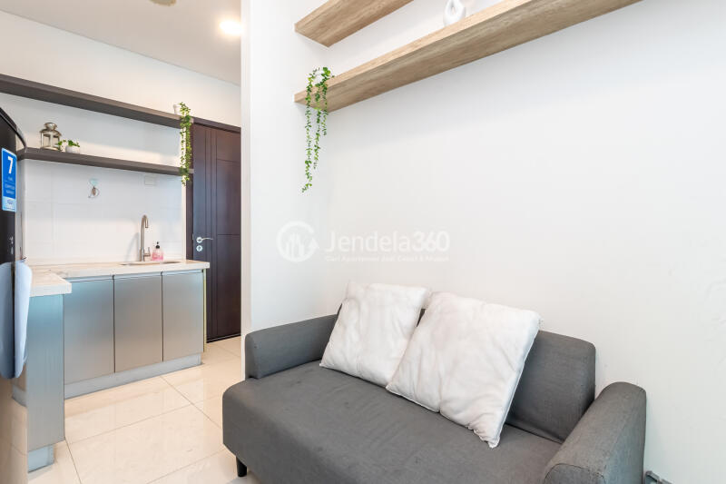 Living Room Middle Floor Studio Apartment with City View at Brooklyn Alam Sutera Apartment