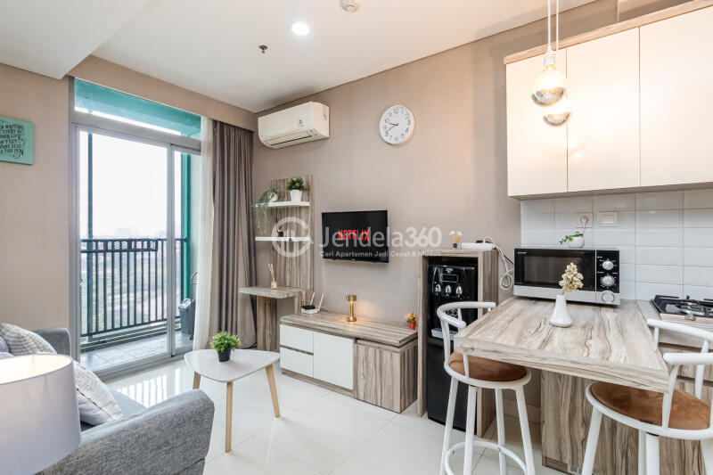 Living Room Low Floor 1BR Apartment with City View at Pejaten Park Residence