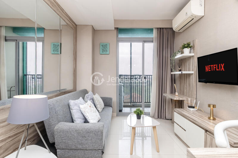 Living Room Low Floor 1BR Apartment with City View at Pejaten Park Residence