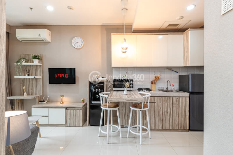 Living Room Low Floor 1BR Apartment with City View at Pejaten Park Residence