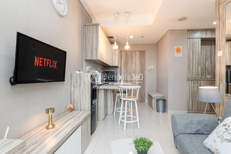 Living Room Low Floor 1BR Apartment with City View at Pejaten Park Residence