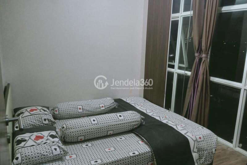 Bedroom 2 Low Floor 2BR Apartment with  View at The Medina Apartment