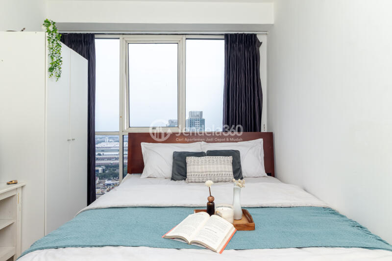 Bedroom 1 2BR Apartment with - View at Tifolia Apartment