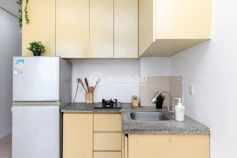 Kitchen 2BR Apartment with - View at Tifolia Apartment