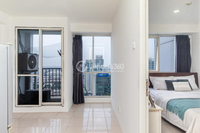 Living Room 2BR Apartment with - View at Tifolia Apartment
