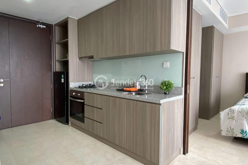 Kitchen Low Floor 1BR Apartment with - View at Ciputra World 2 Apartment