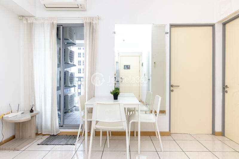 Living Room High Floor 3BR Apartment with City View at M Town Residence Serpong