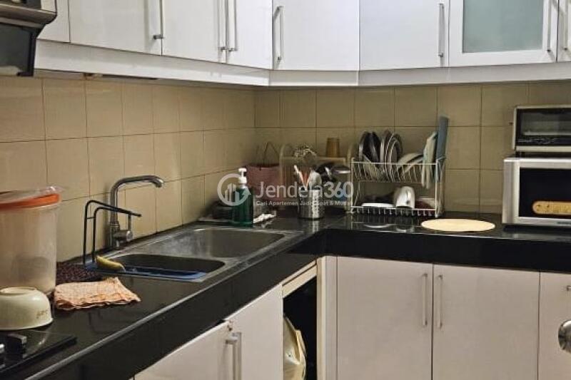 Kitchen Comfortable 2BR Apartment at Essence Darmawangsa Apartment Tower Eminence 1
