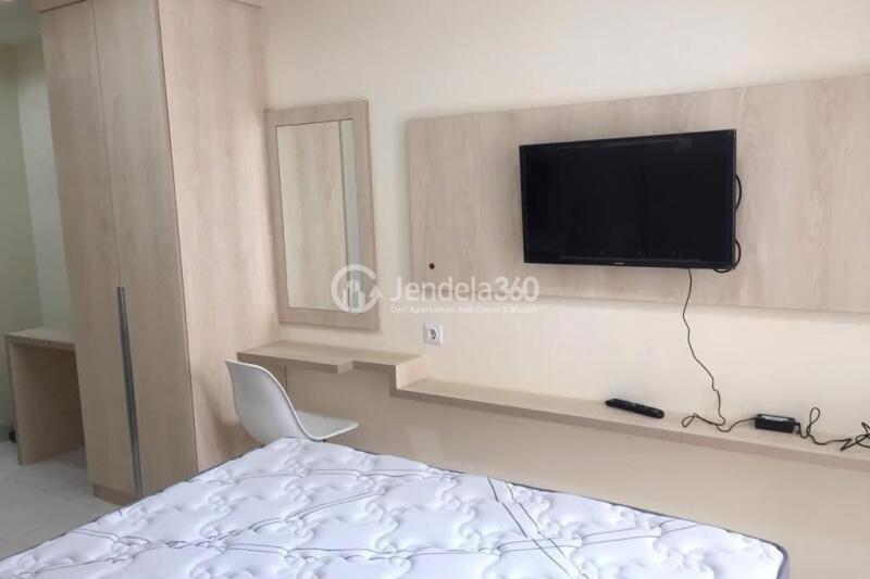 Bedroom Studio Apartment with Swimming Pool View at Sentul Tower Apartment