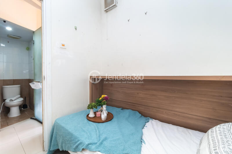 Bedroom 2 Low Floor 2BR Apartment with  View at Green Pramuka City Apartment