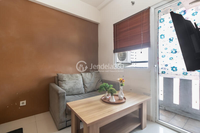 Living Room Low Floor 2BR Apartment with  View at Green Pramuka City Apartment