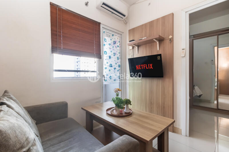 Living Room Low Floor 2BR Apartment with  View at Green Pramuka City Apartment