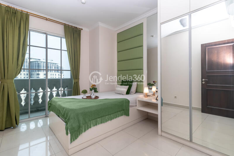 Bedroom 2 Peaceful 2BR Apartment at Belleza Apartment Tower Albergo