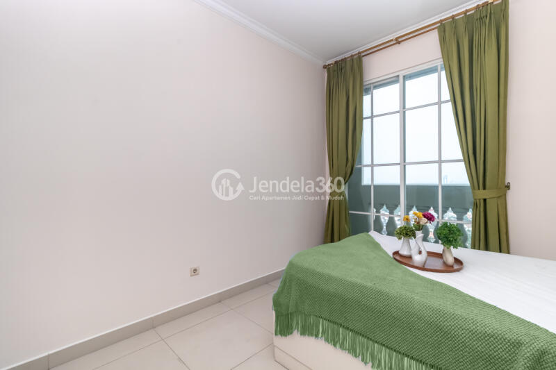 Bedroom 2 Peaceful 2BR Apartment at Belleza Apartment Tower Albergo