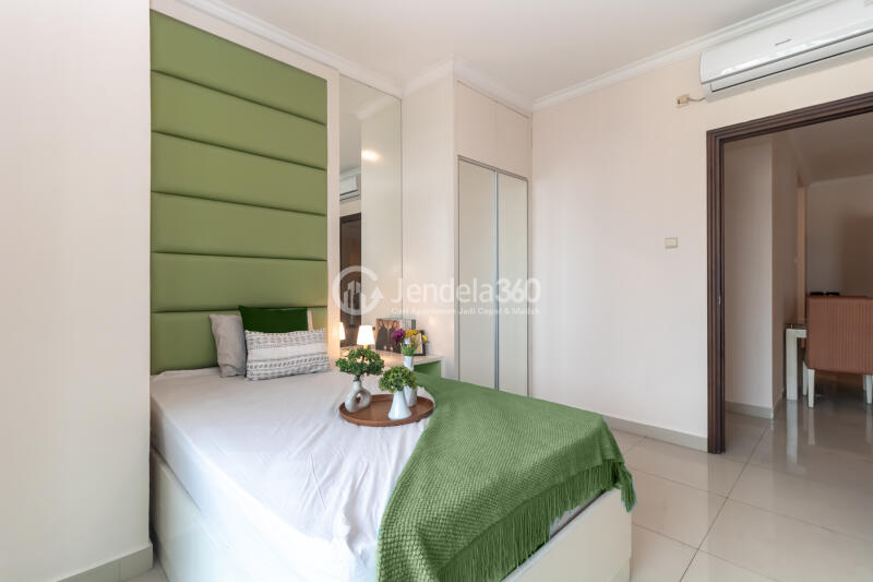 Bedroom 2 Peaceful 2BR Apartment at Belleza Apartment Tower Albergo