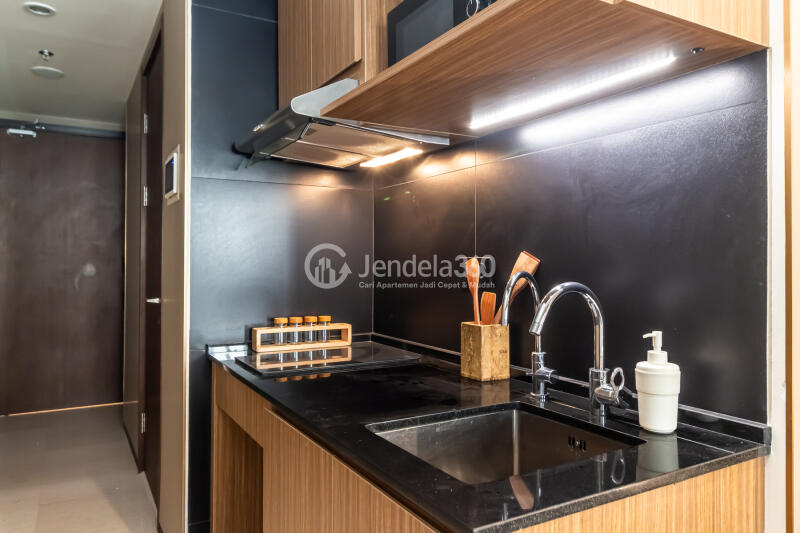 Kitchen Elegant Studio Apartment at Branz Mega Kuningan Apartment Low Floor
